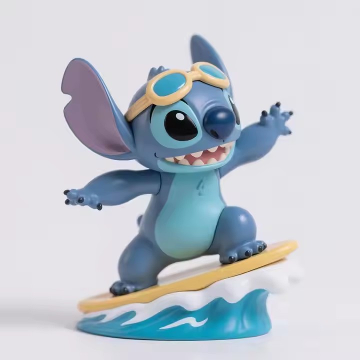 Cute Stitch-inspired cartoon PVC figurine with big ears and blue body for collectible display
